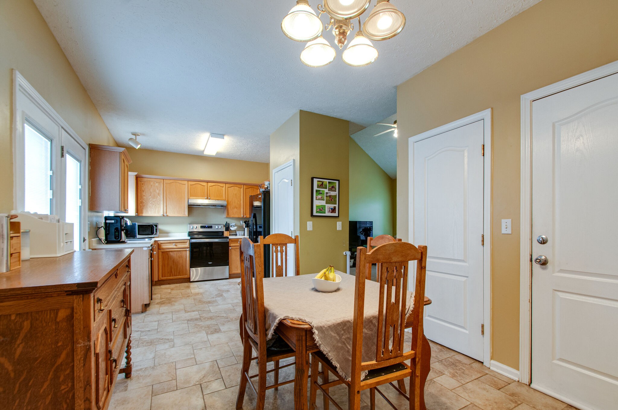 7230 Blue Ridge Drive Fairview, TN 37062 - Photo 10 of 28 a view of a dining room with furniture and a chandelier