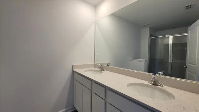 a bathroom with a shower and a toilet