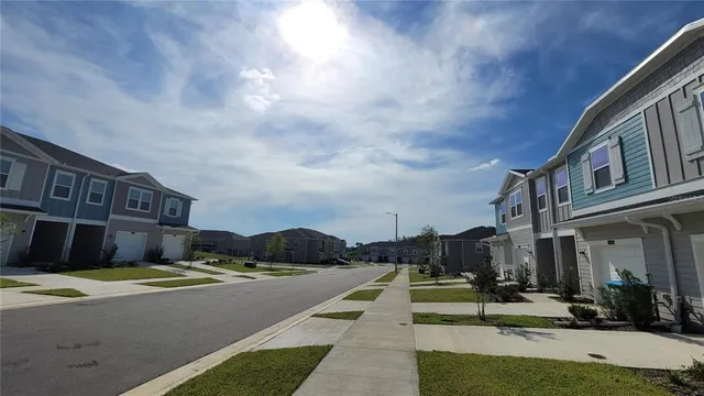 a view of city with tall buildings