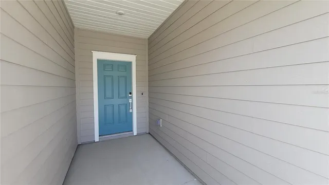 a view of a door and wooden roof