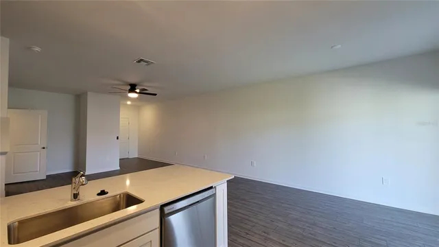 an entryway of a room with windows