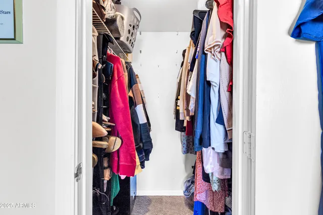 a kitchen with stainless steel appliances granite countertop a refrigerator and microwave