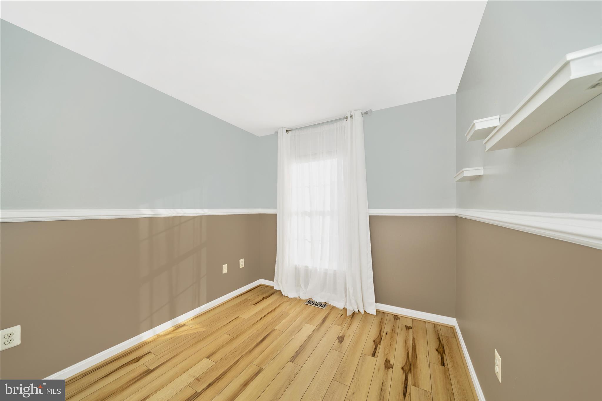 113 Fieldstone Court Frederick, MD 21702 - Photo 33 of 66 a view of room with wooden floor