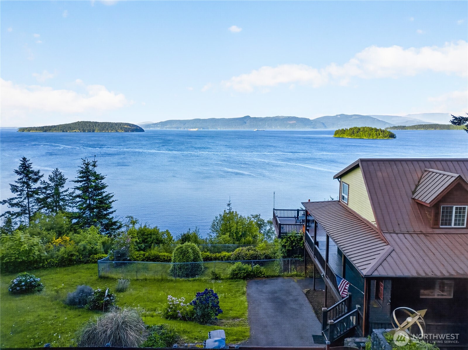4623 Guemes Island Road Anacortes, WA 98221 - Photo 30 of 40 a view of a terrace with a table and chairs