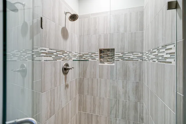a bathroom with a shower curtain