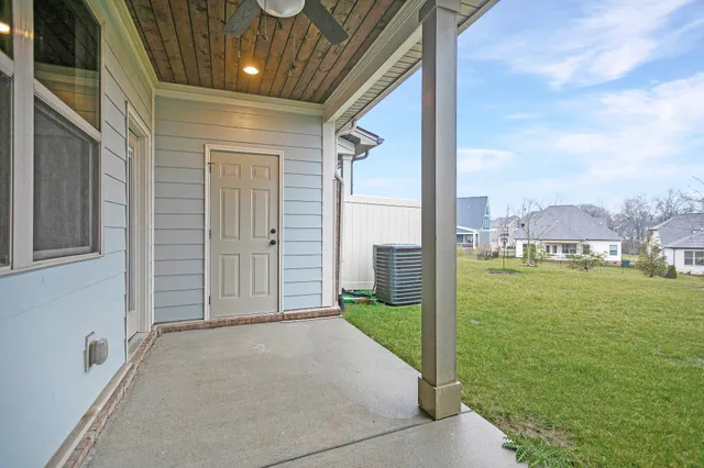 a view of a porch with a backyard