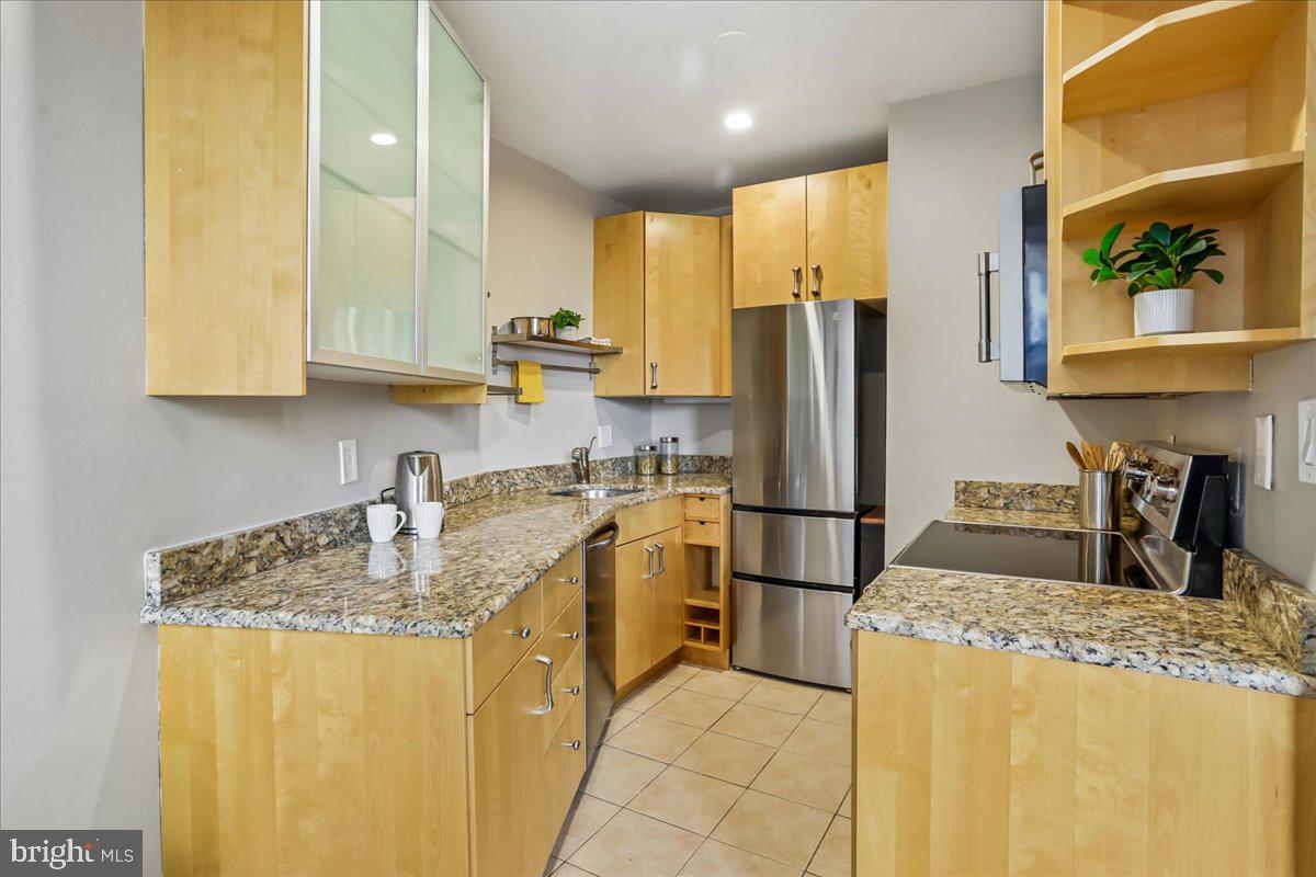 2129 Florida Avenue Northwest, Unit 407 Washington, DC 20008 - Photo 16 of 46 Modern kitchen with sleek finishes.