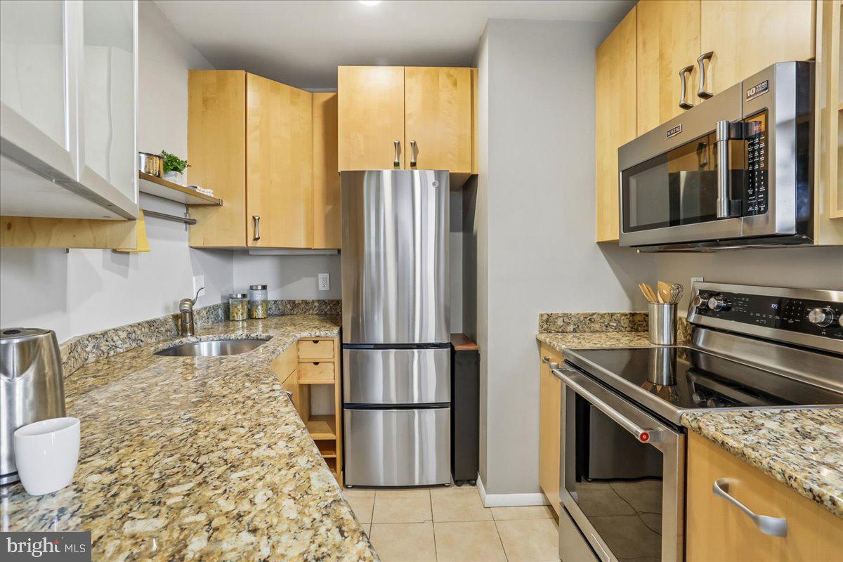 2129 Florida Avenue Northwest, Unit 407 Washington, DC 20008 - Photo 17 of 46 Sleek kitchen with modern finishes.