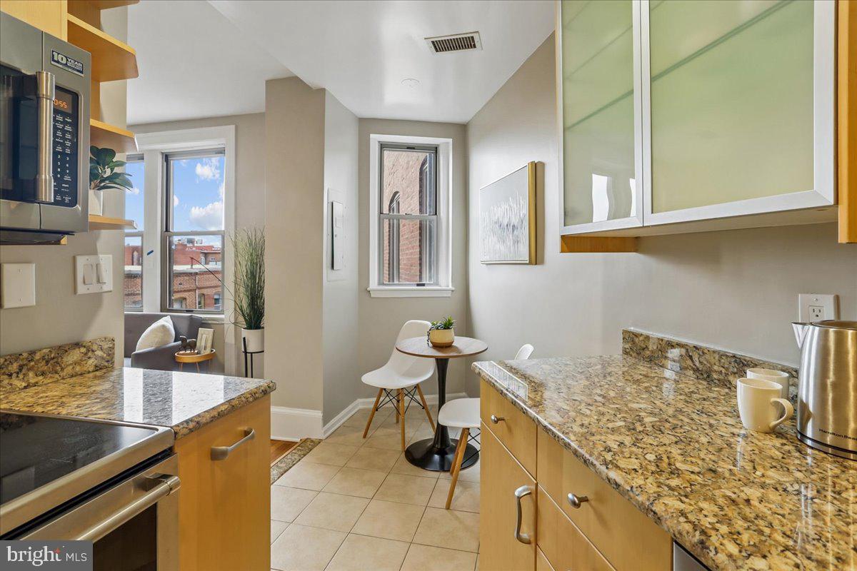 2129 Florida Avenue Northwest, Unit 407 Washington, DC 20008 - Photo 19 of 46 Bright and airy urban kitchen retreat.