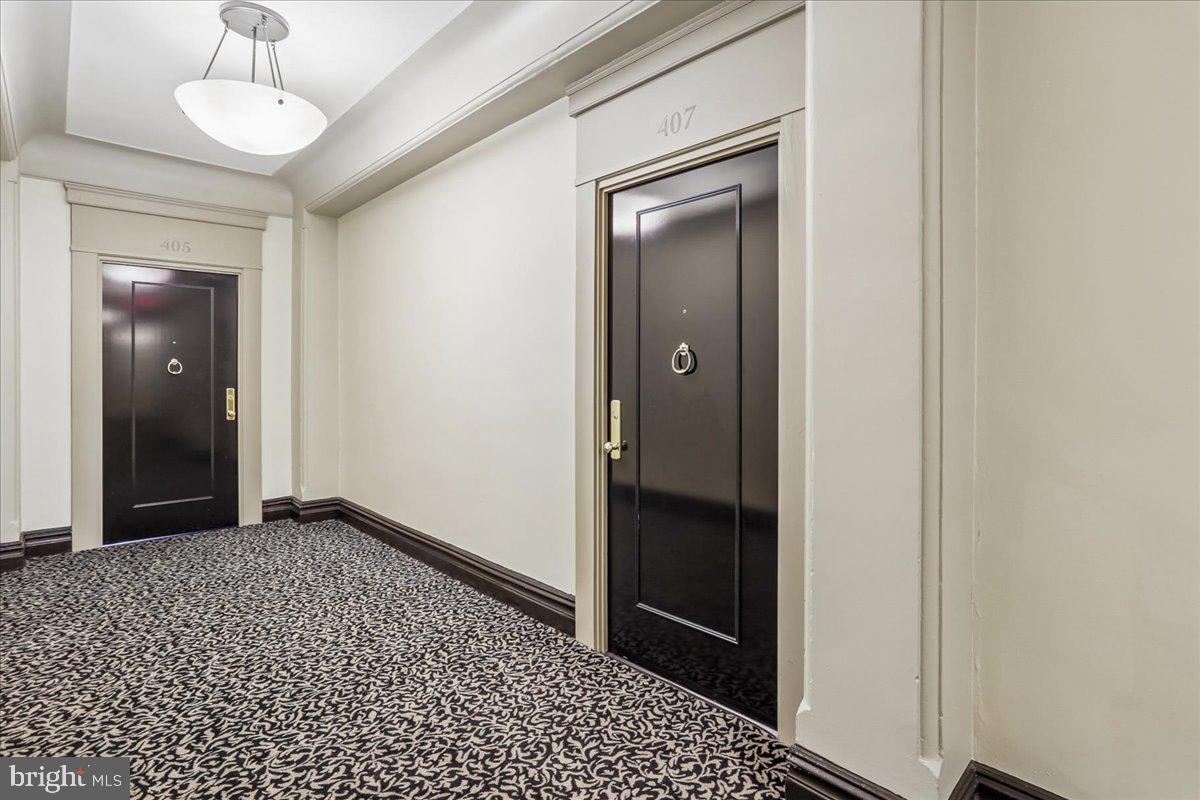 2129 Florida Avenue Northwest, Unit 407 Washington, DC 20008 - Photo 6 of 46 Elegant corridor with stylish doors.
