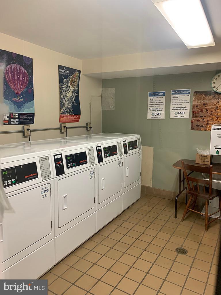 1825 T Street Northwest, Unit 303 Washington, DC 20009 - Photo 14 of 16 Clean and bright laundry room