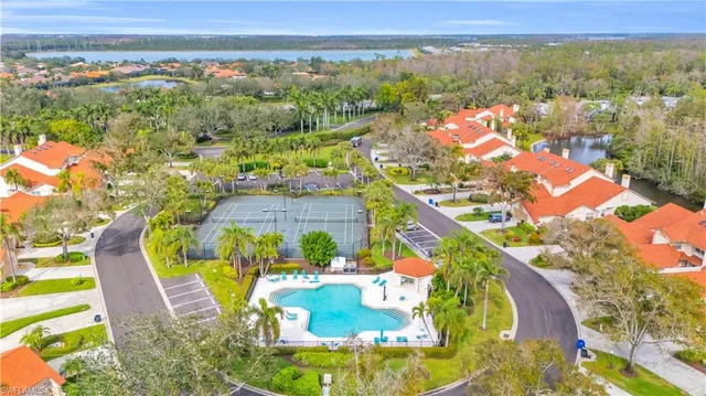 an aerial view of a house with a ocean view