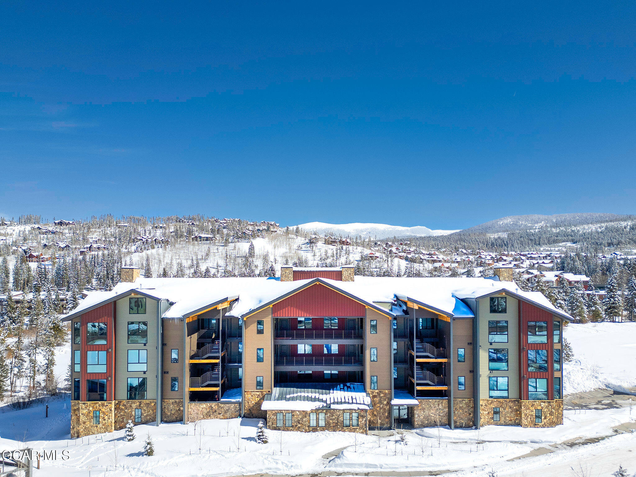 720 Baker Drive, Unit 410 Winter Park, CO 80482 - Photo 23 of 37 Drone front .levation