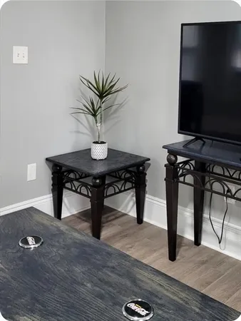 a view of a workspace with furniture