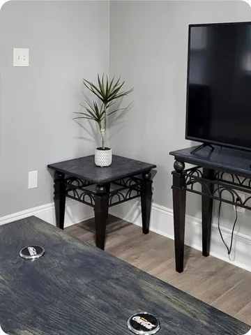 a view of a workspace with furniture