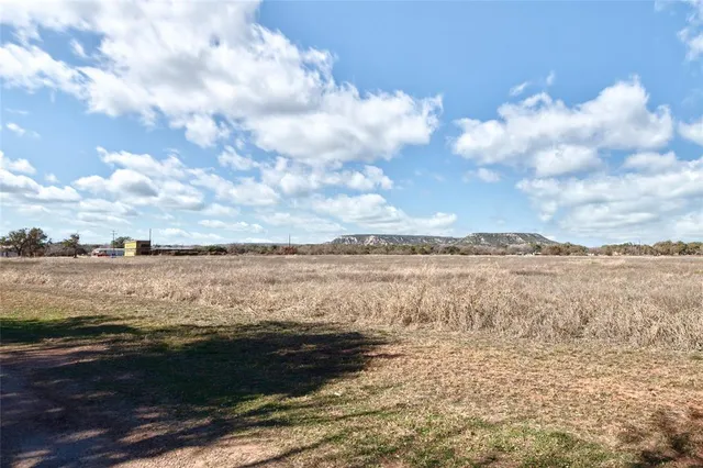 a view of a lake from a yard