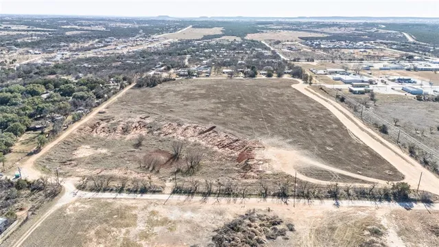 a view of an outdoor space with mountain view in back