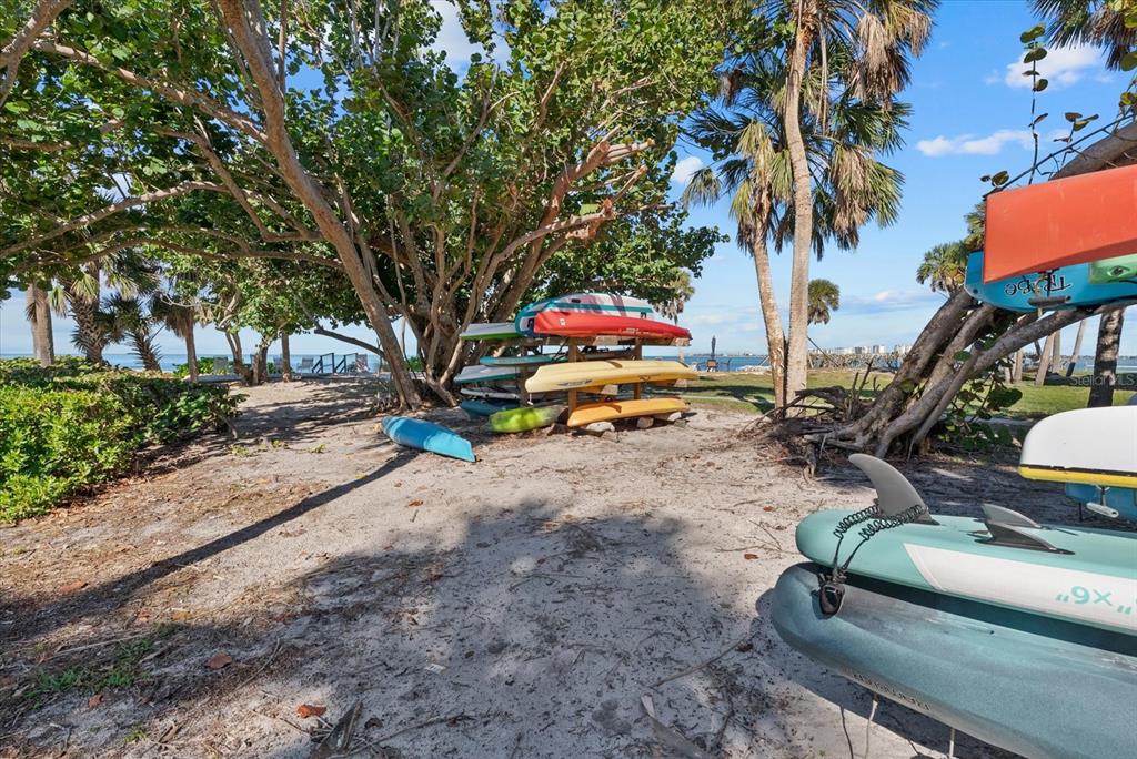 35 Sandy Cove Road, Unit 2A Sarasota, FL 34242 - Photo 42 of 49 a small garden covered with tall trees