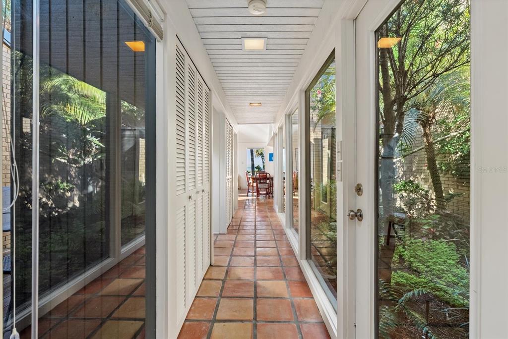 35 Sandy Cove Road, Unit 2A Sarasota, FL 34242 - Photo 7 of 49 a view of a narrow alley