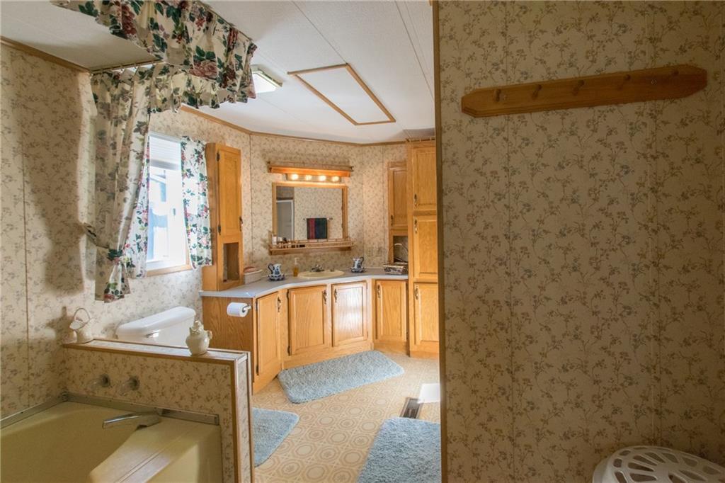 818 Grindstone Road Medway, ME 04460 - Photo 21 of 24 large master bath with soaking tub...