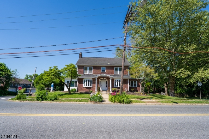 192 Lincoln Road Phillipsburg, NJ 08865 - Photo 5 of 50 a front view of a house with a yard and a garage