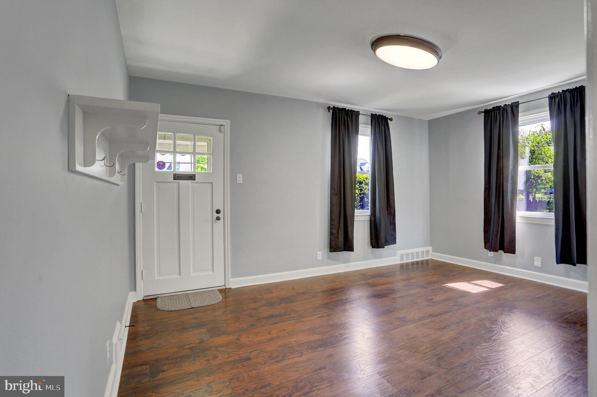 1057 Fairview Road Hagerstown, MD 21742 - Photo 4 of 32 Updated paint and flooring living room bright!