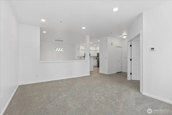 a view of a big room with large windows