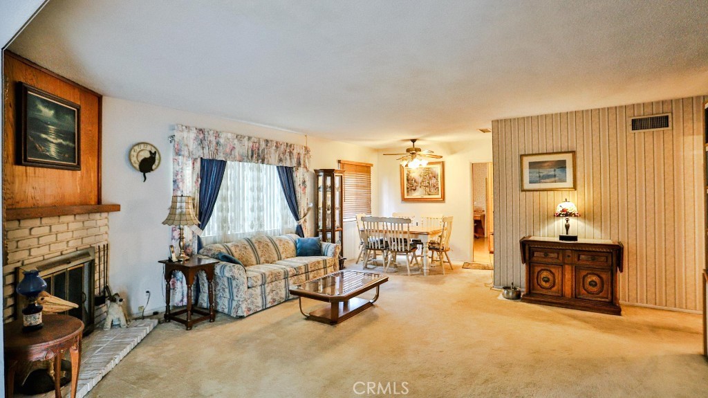 428 West 8th Street Upland, CA 91786 - Photo 12 of 50 a living room with furniture and a fireplace