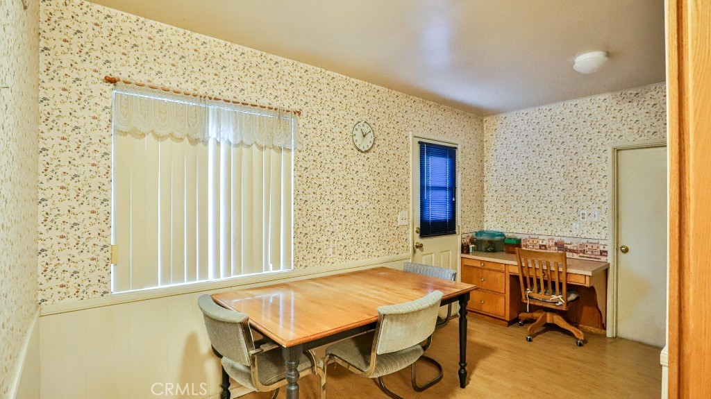 428 West 8th Street Upland, CA 91786 - Photo 20 of 50 a view of a workspace with furniture and a window