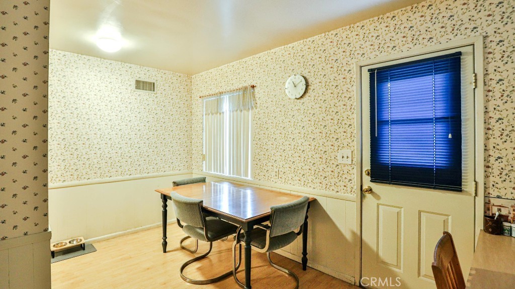 428 West 8th Street Upland, CA 91786 - Photo 22 of 50 a view of a room with furniture and wooden floor