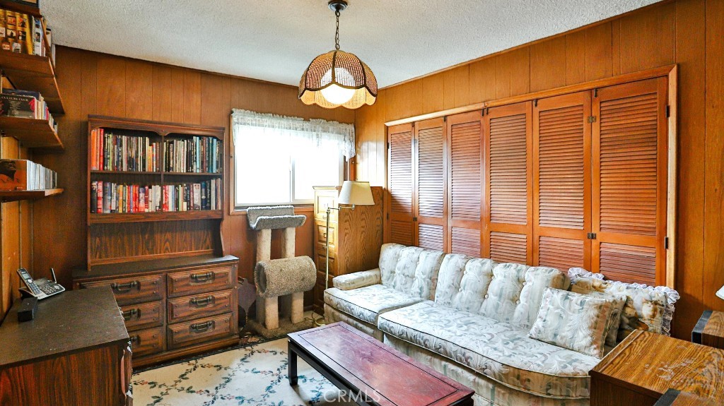 428 West 8th Street Upland, CA 91786 - Photo 30 of 50 a living room with furniture and a window