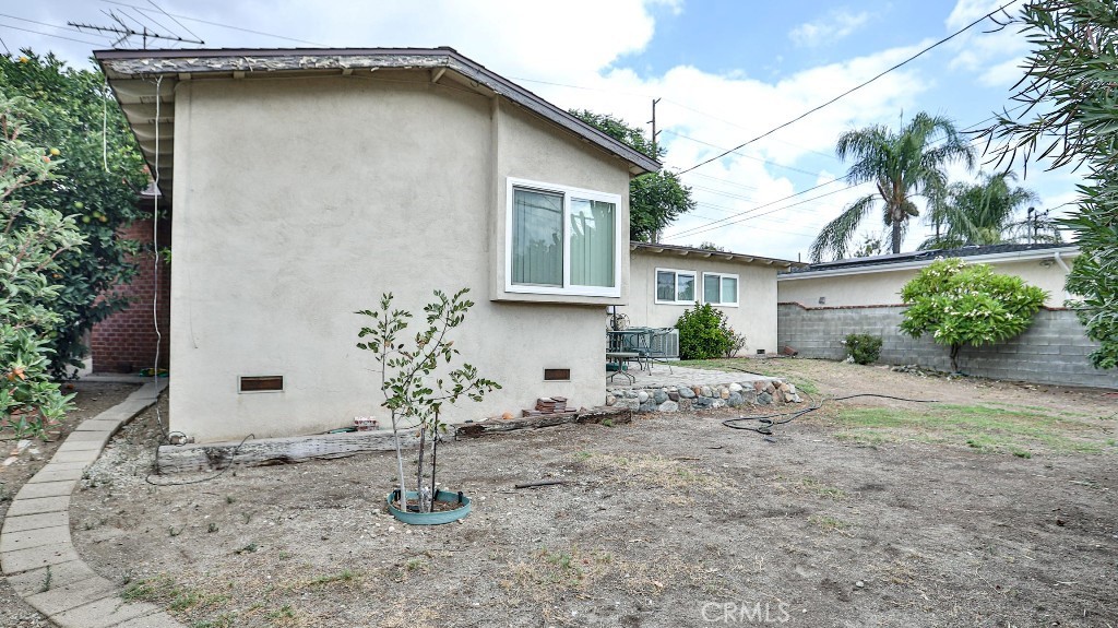 428 West 8th Street Upland, CA 91786 - Photo 48 of 50 a house that has a tree in front of it