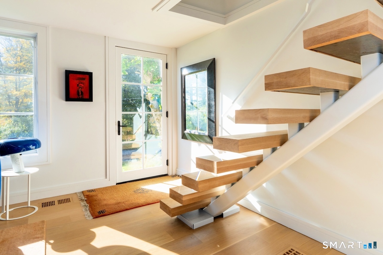 31 Belgo Road Salisbury, CT 06039 - Photo 11 of 25 a living room with furniture and a large window