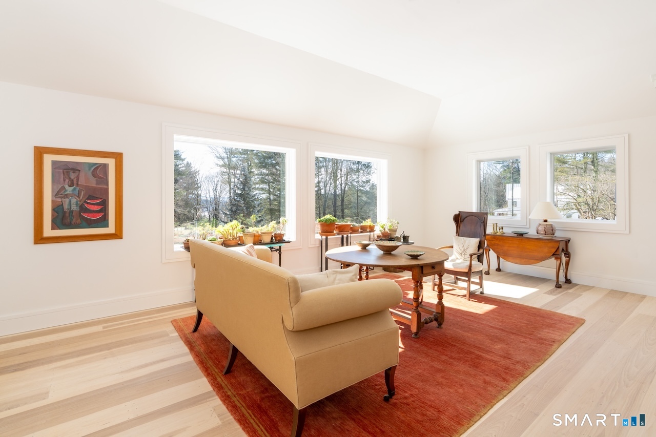 31 Belgo Road Salisbury, CT 06039 - Photo 20 of 25 a living room with furniture and a large window