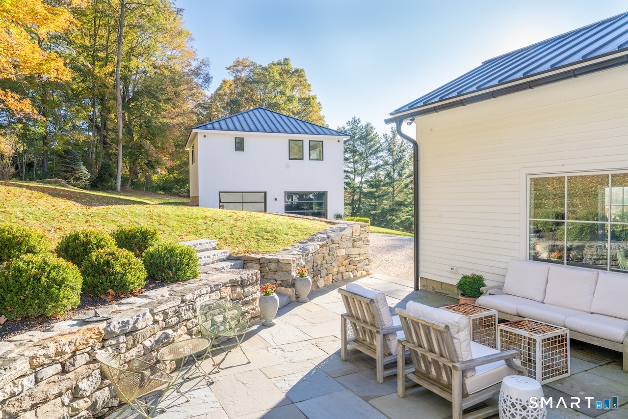 31 Belgo Road Salisbury, CT 06039 - Photo 23 of 25 a view of a house with backyard and sitting area