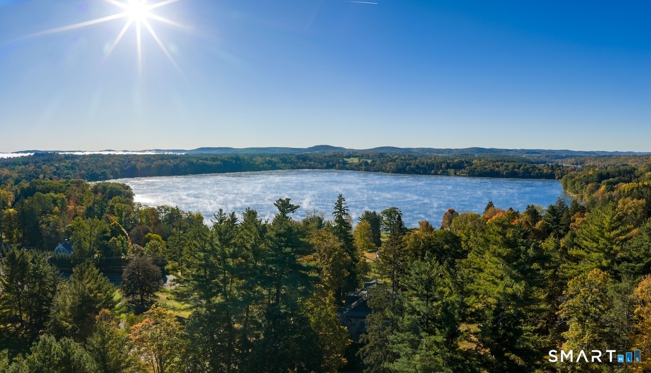 31 Belgo Road Salisbury, CT 06039 - Photo 25 of 25 a view of a lake with a mountain in the background