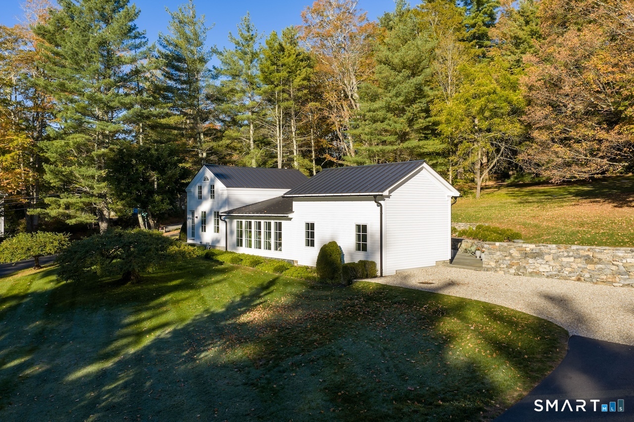 31 Belgo Road Salisbury, CT 06039 - Photo 5 of 25 a front view of a house with a garden