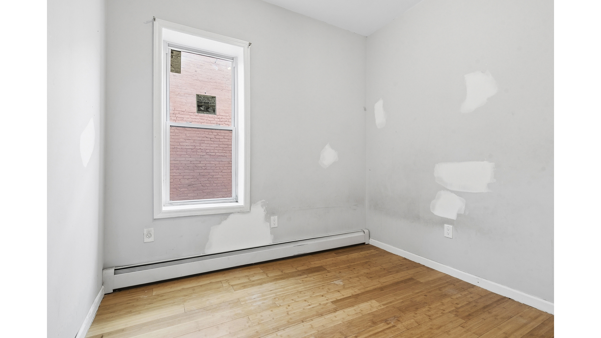 2001 Strauss Street, Unit 2 Brooklyn, NY 11212 - Photo 6 of 6 a view of empty room with wooden floor