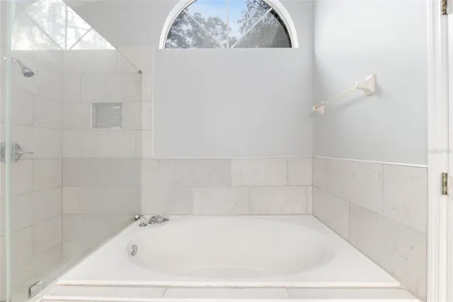 a bathroom with a bathtub