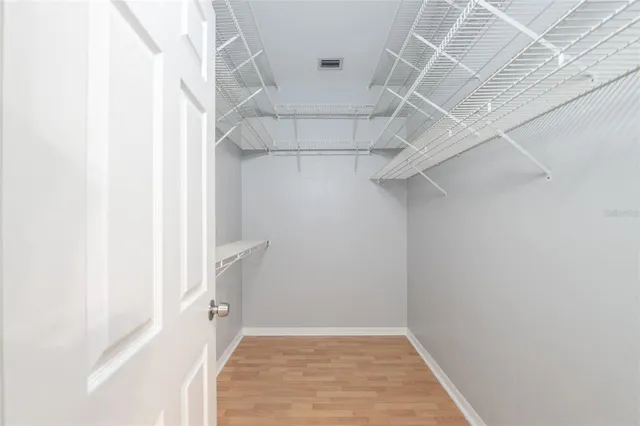 a view of a room with racks on the wall