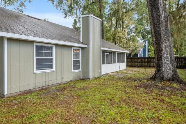 a house with trees in front of it