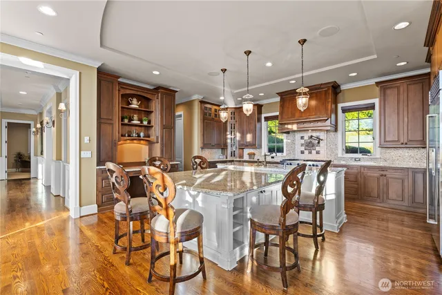 a view of a dining area with furniture and wooden floor