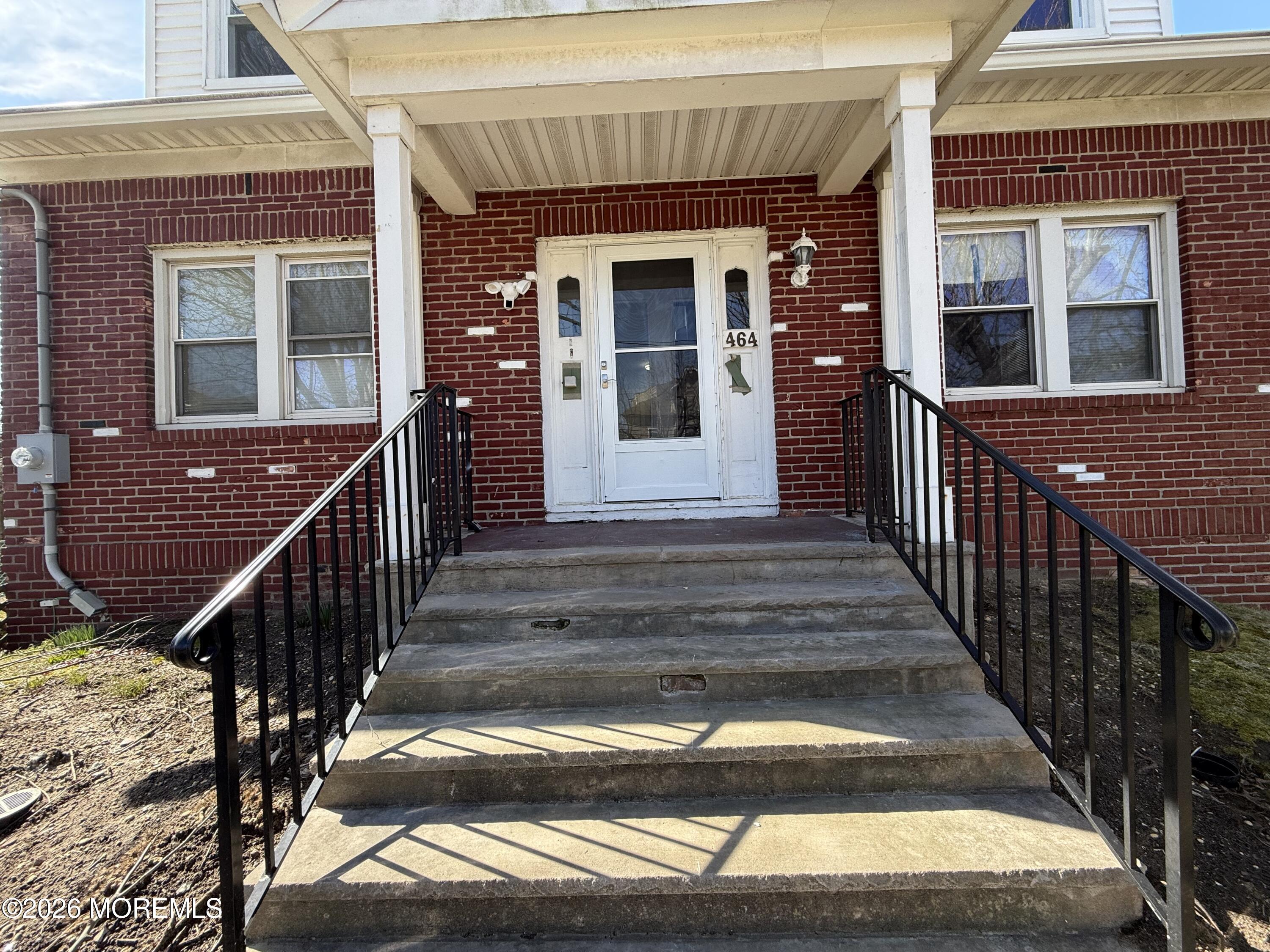 464 2nd Avenue, Unit 1 Long Branch, NJ 07740 - Photo 2 of 37 a view of a house with wooden door and windows