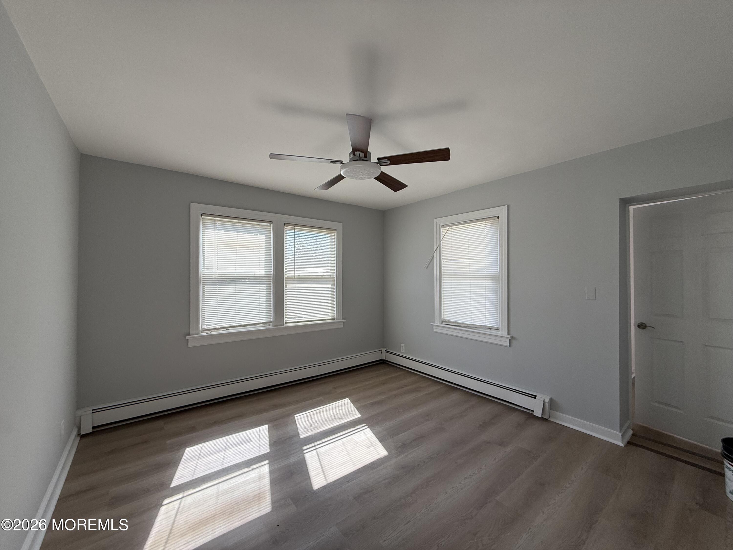 464 2nd Avenue, Unit 1 Long Branch, NJ 07740 - Photo 21 of 37 a view of an empty room with a window