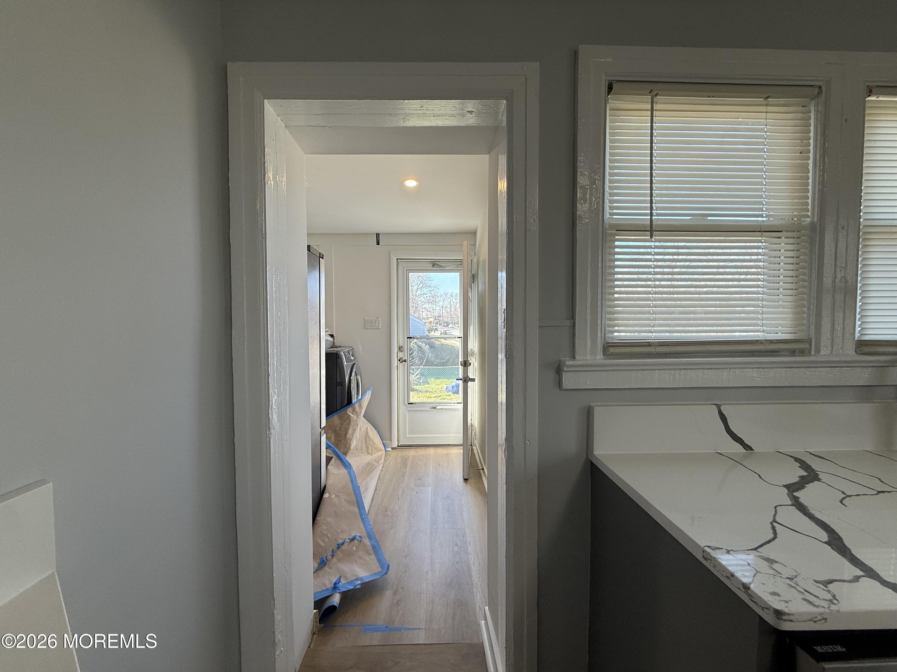 464 2nd Avenue, Unit 1 Long Branch, NJ 07740 - Photo 25 of 37 a en suite bathroom with a sink and a mirror