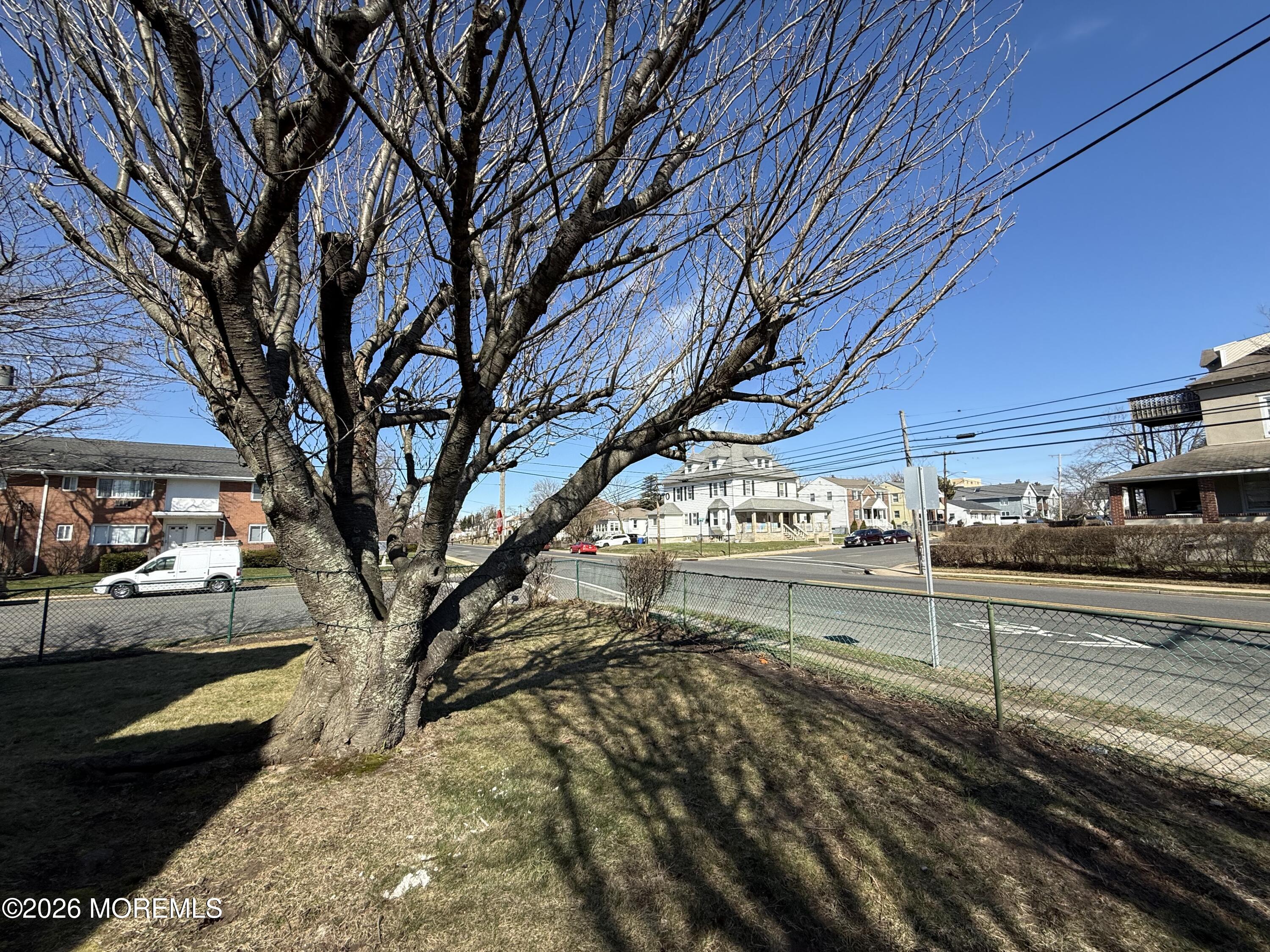 464 2nd Avenue, Unit 1 Long Branch, NJ 07740 - Photo 5 of 37 a view of a yard with car parked