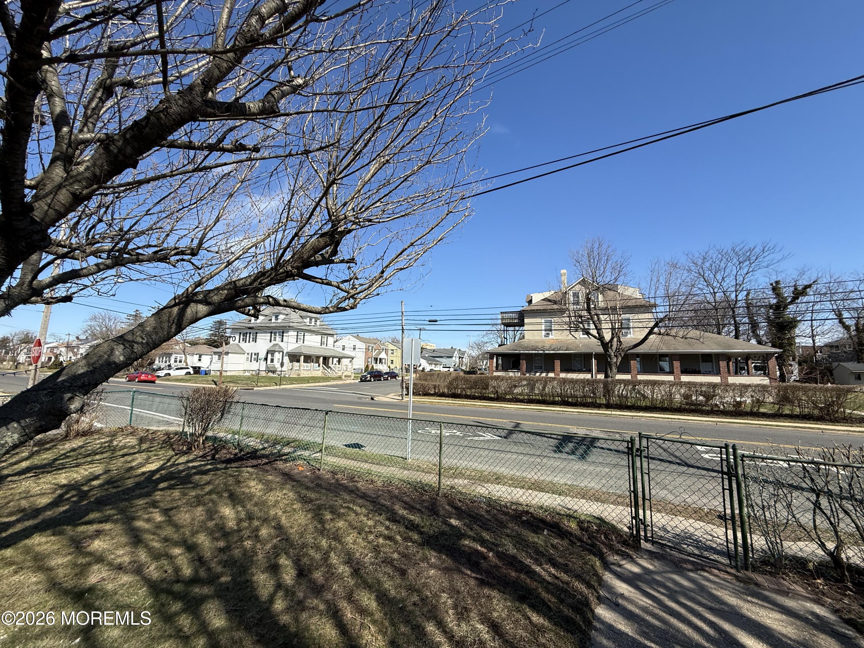 464 2nd Avenue, Unit 1 Long Branch, NJ 07740 - Photo 6 of 37 a view of a yard and car parked