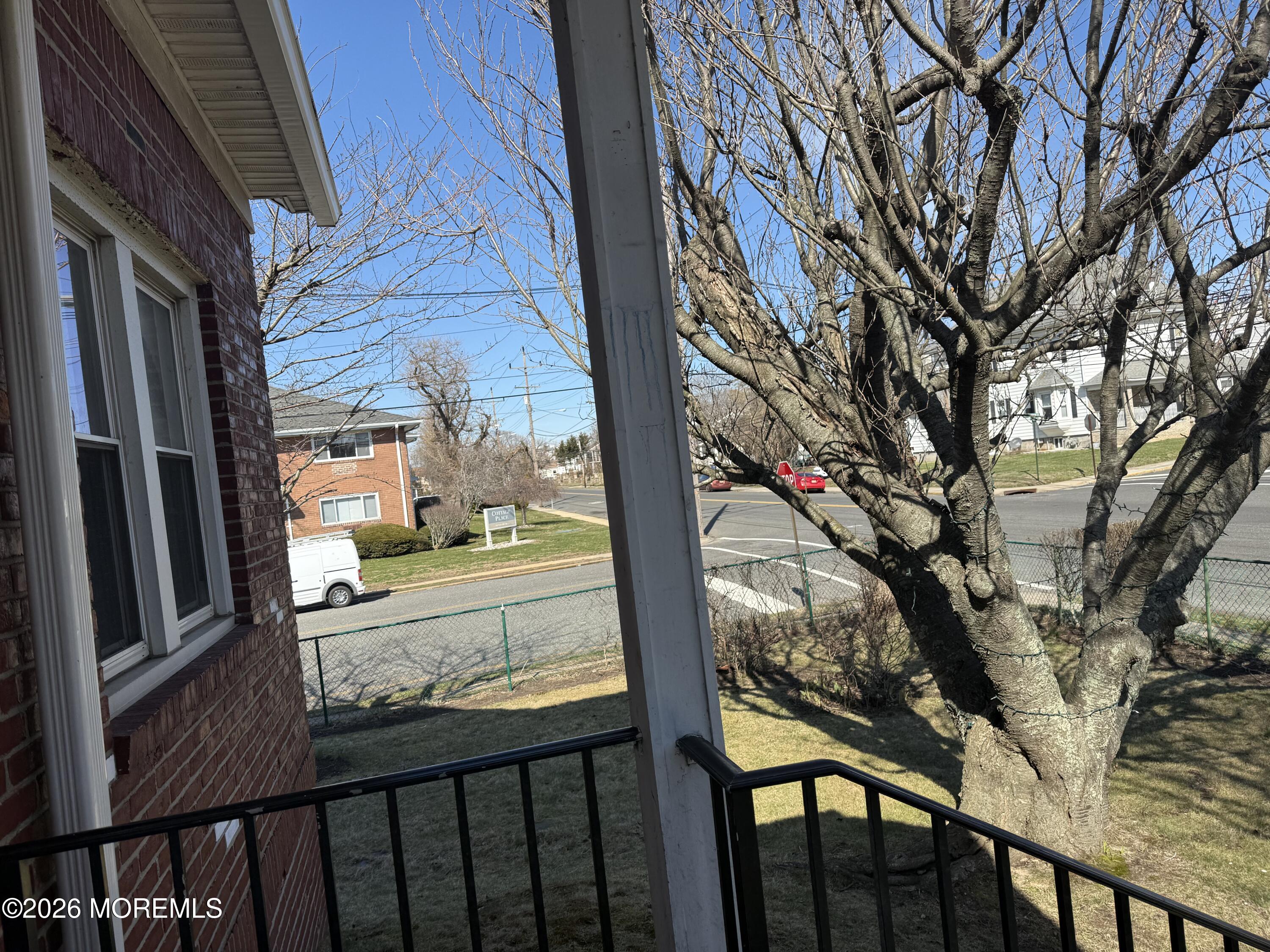 464 2nd Avenue, Unit 1 Long Branch, NJ 07740 - Photo 7 of 37 a view of a porch with a yard