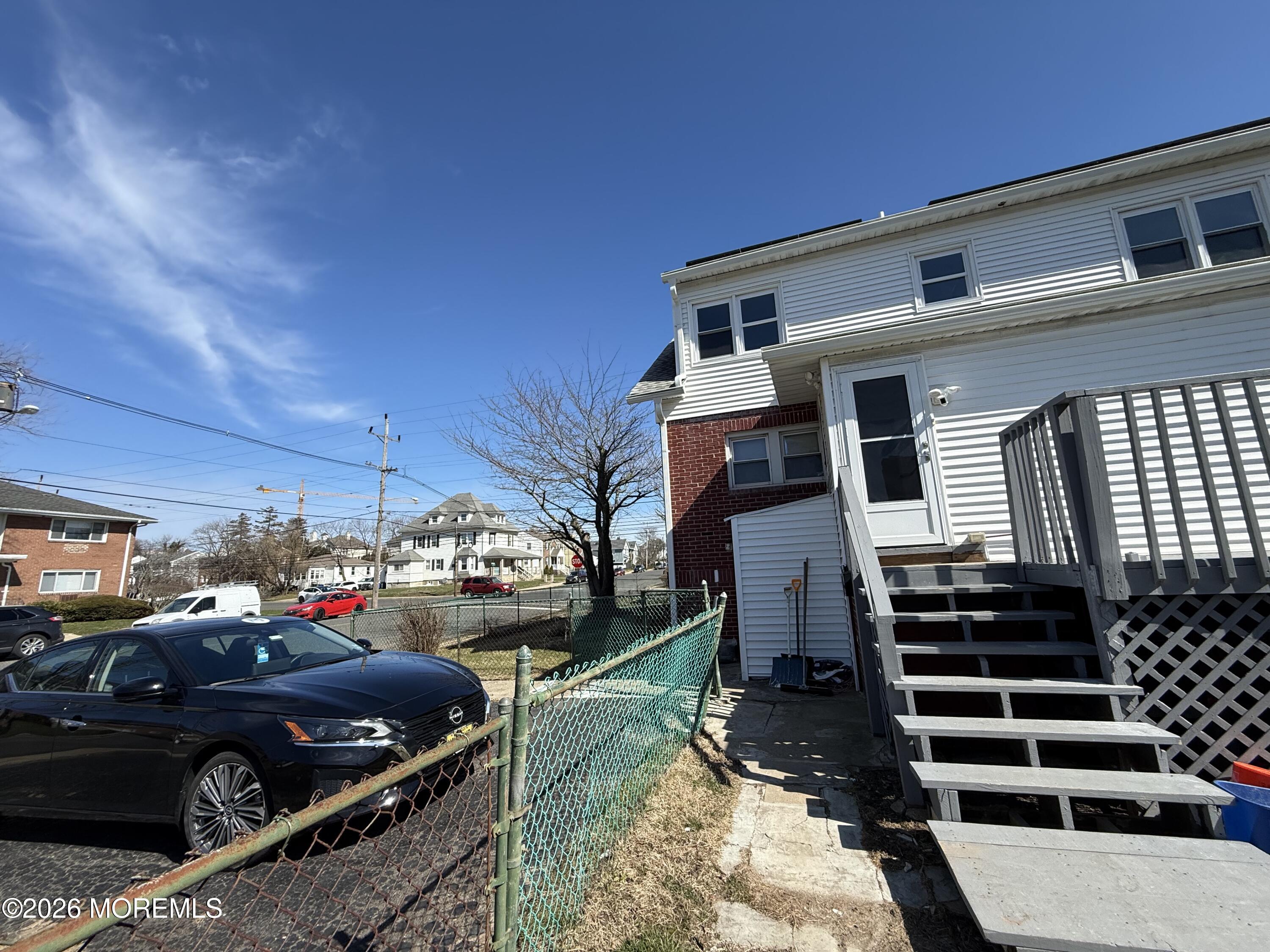 464 2nd Avenue, Unit 1 Long Branch, NJ 07740 - Photo 10 of 37 a view of a car park in front of the house