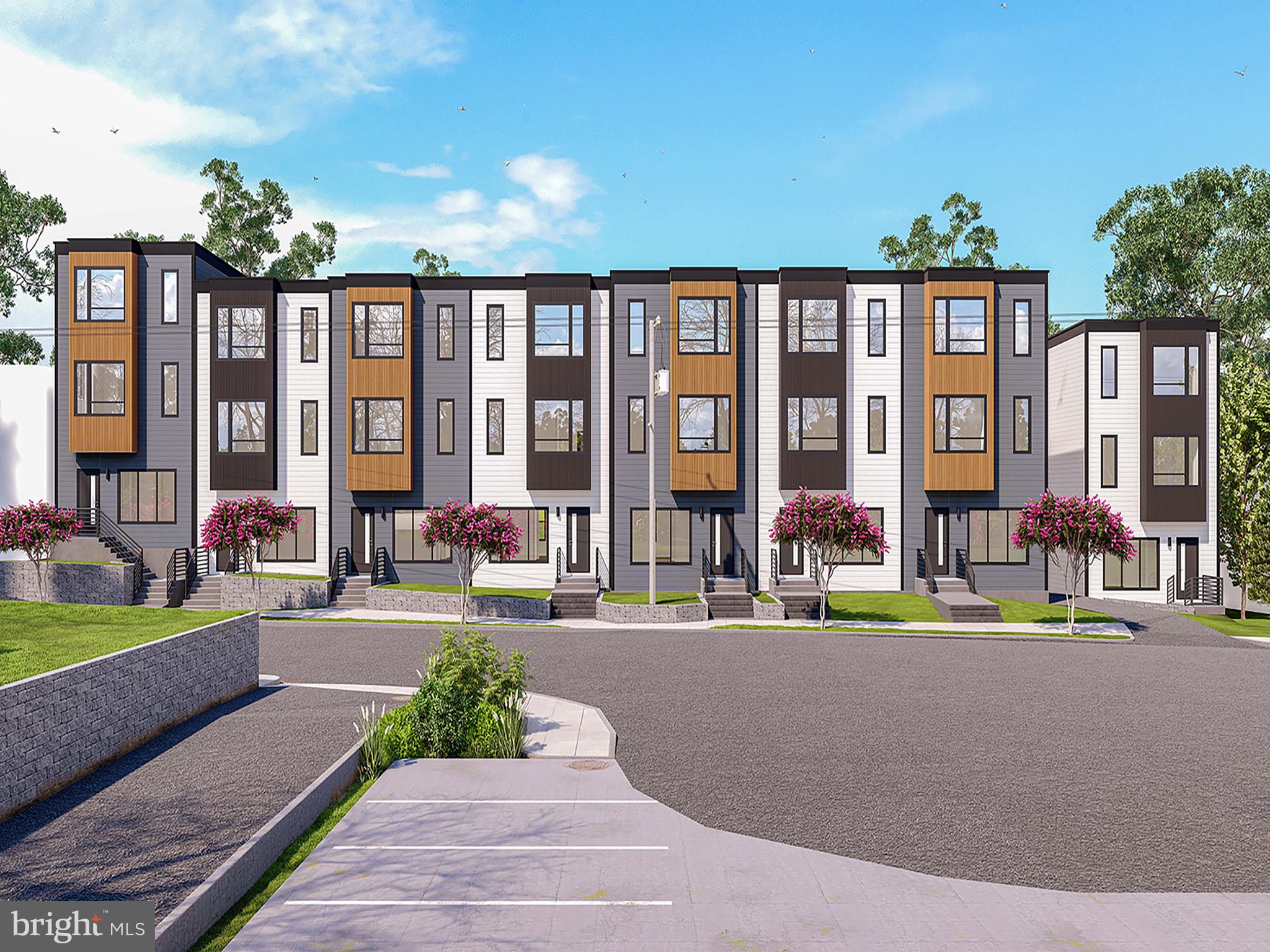 2530 Elvans Road Southeast Washington, DC 20020 - Photo 1 of 5 a front view of a building with street